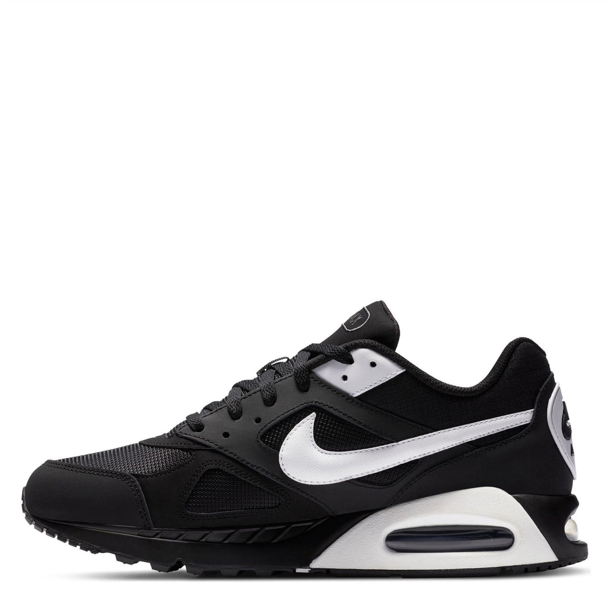 Black low-top trainers with white swoosh, perforated panels, and air unit midsole