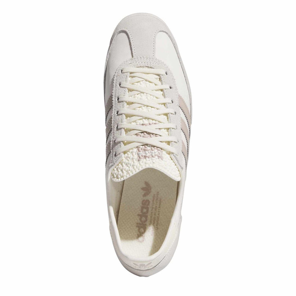 adidas Originals sneakers front view in white with cream laces and textured tongue