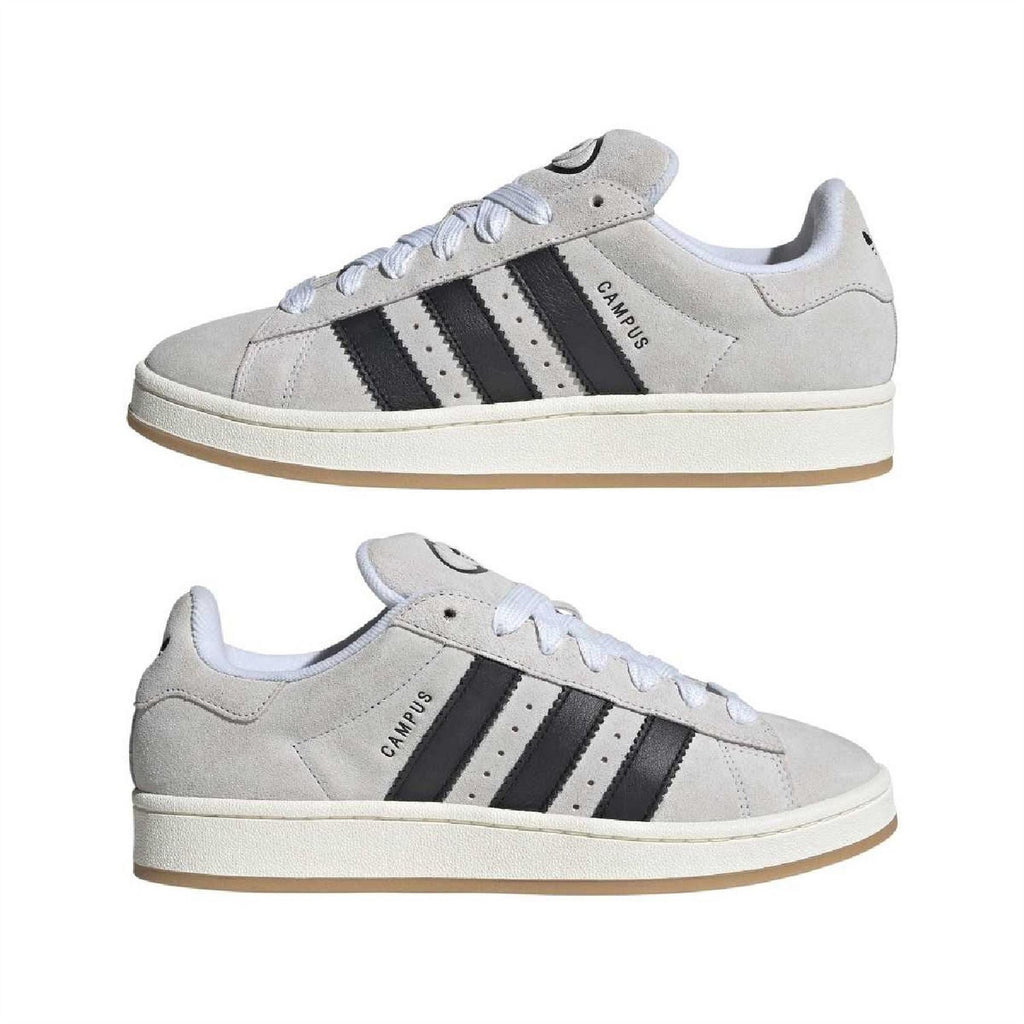 Two light gray Adidas campus sneakers with black three-stripe panels and gum soles