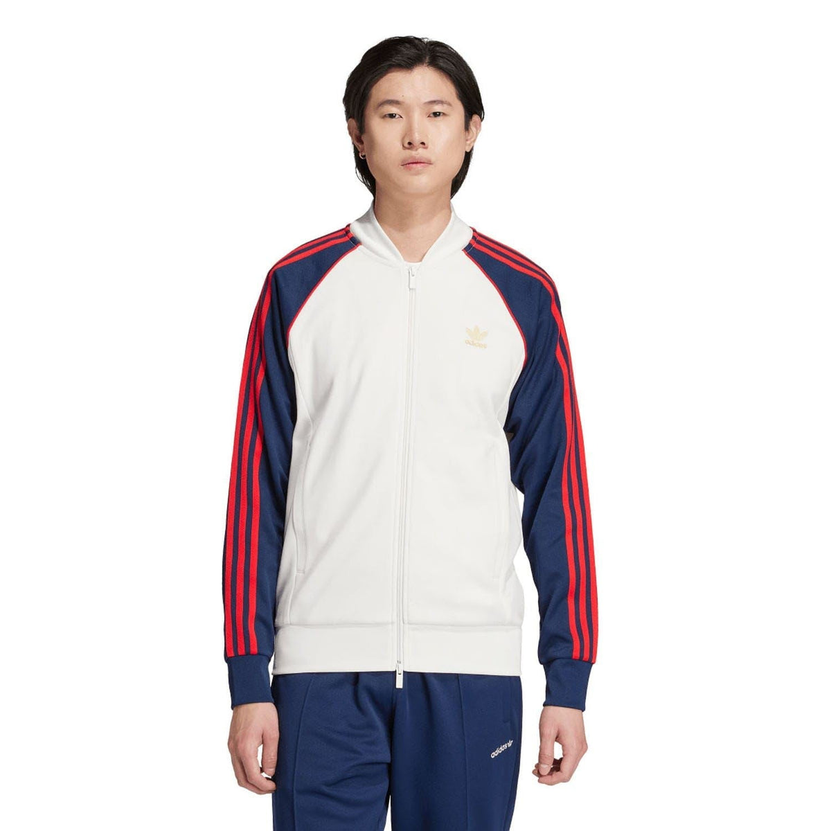 White track jacket with navy sleeves, red stripes, full zip front, mock neck