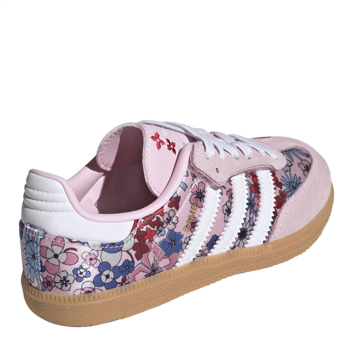 Pink low-top sneakers with floral heel lining, white stripes, and lace-up front.