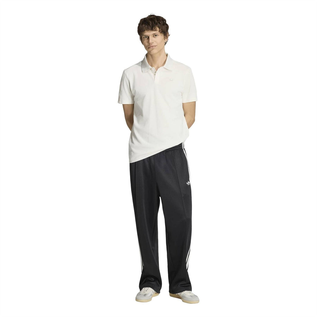 Cloud white polo shirt with collared neckline and adidas trefoil at the chest