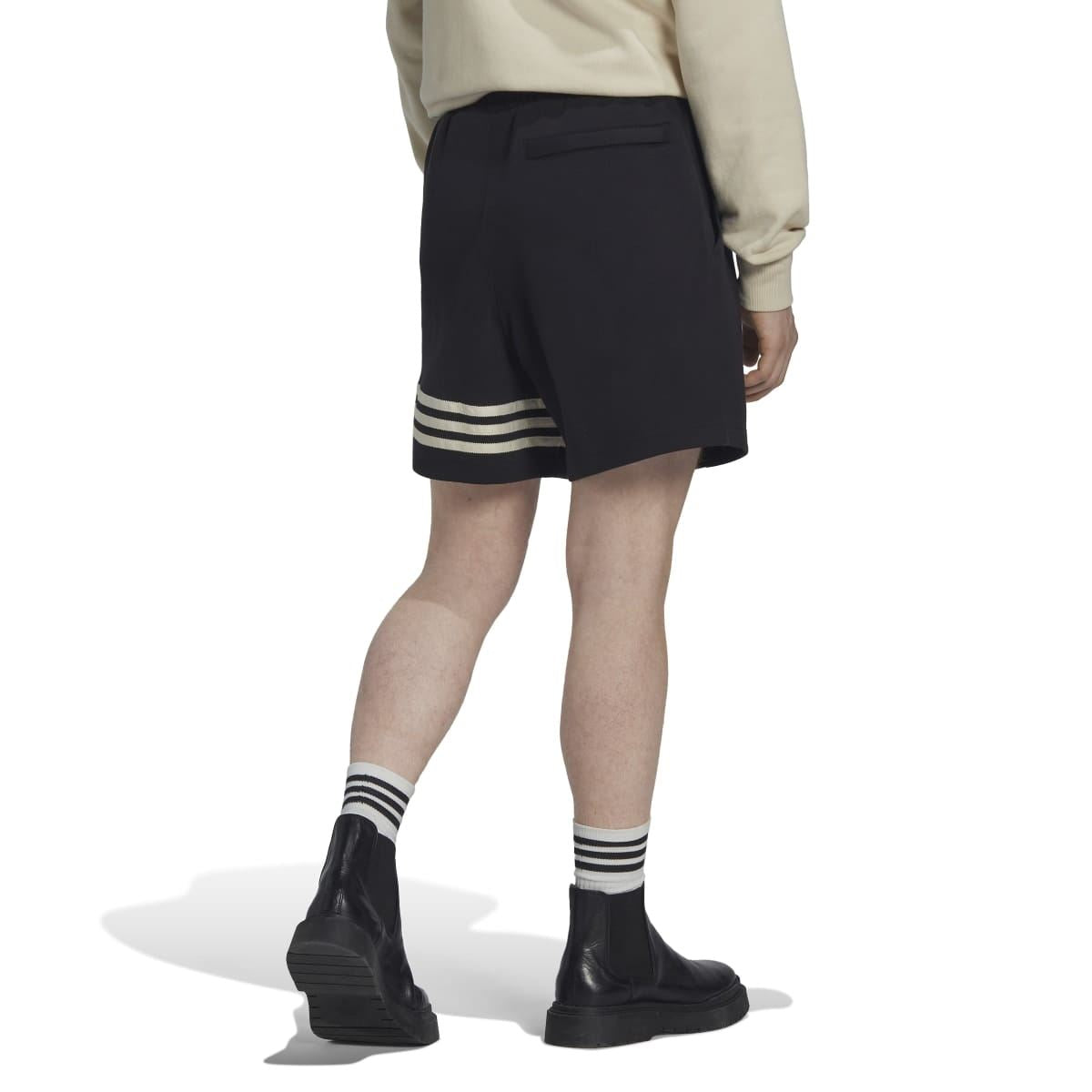 Black shorts with elastic waistband and drawstring, three-striped hem band detail