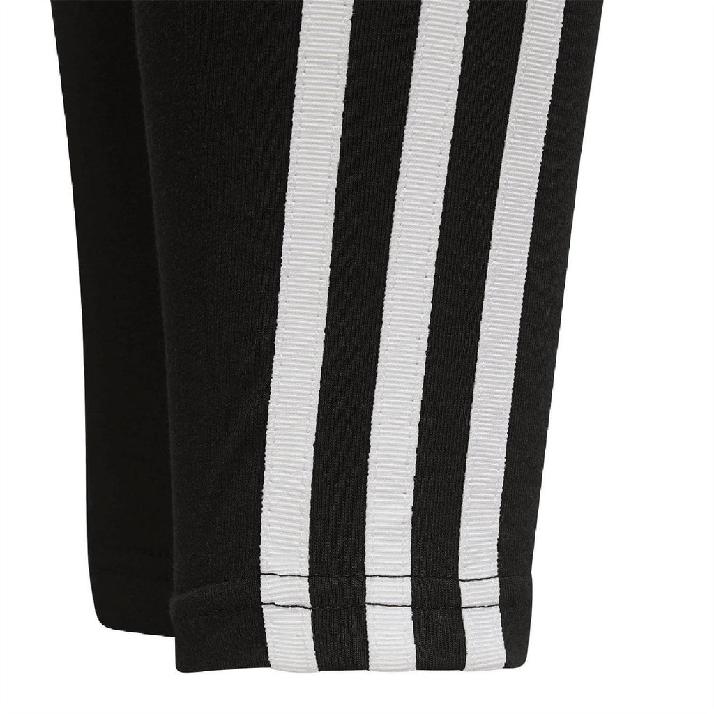 Black leggings with three white side stripes and ribbed cuff at hem