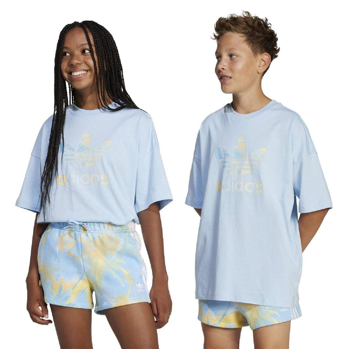 Pink adidas Originals junior sleeved T-shirt for kids aged 8-16, featuring the iconic brand logo and comfortable fit.