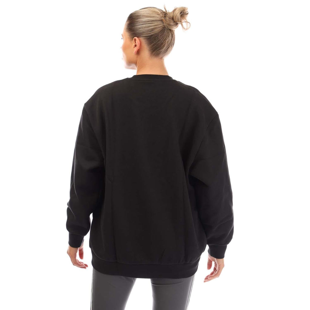 Black crewneck sweatshirt back view with ribbed cuffs and hem