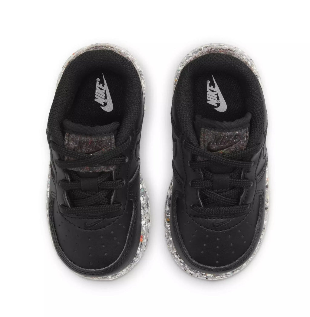 Toddler black sneakers with fabric lining and Nike logo on tongue, lace-up