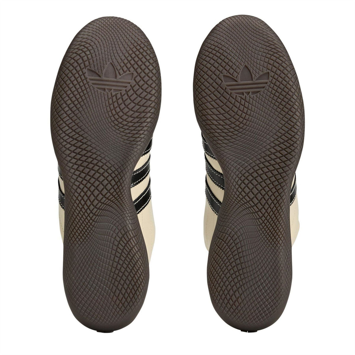 adidas Originals outsoles with textured rubber tread and adidas logo at the heel