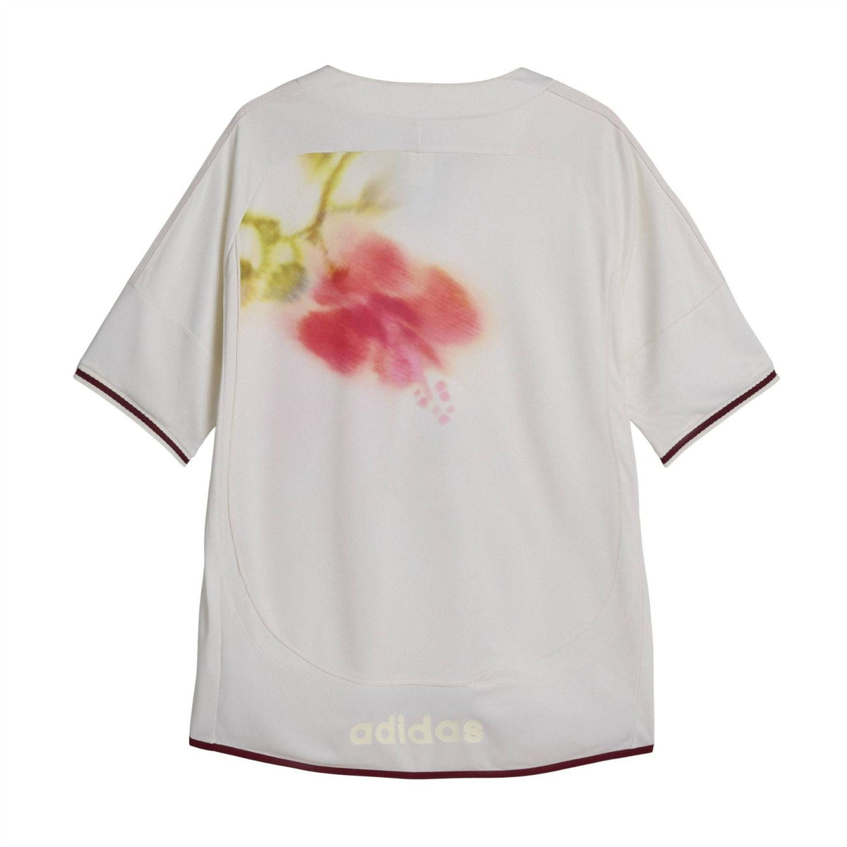 White football jersey with watercolor floral graphic on back and burgundy sleeve/hem trim