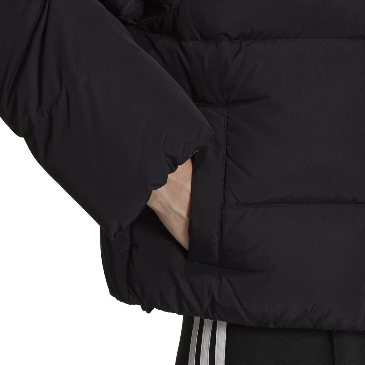 adidas Originals short down jacket, stylish lightweight coat with a hood and quilted design, perfect for cold weather.