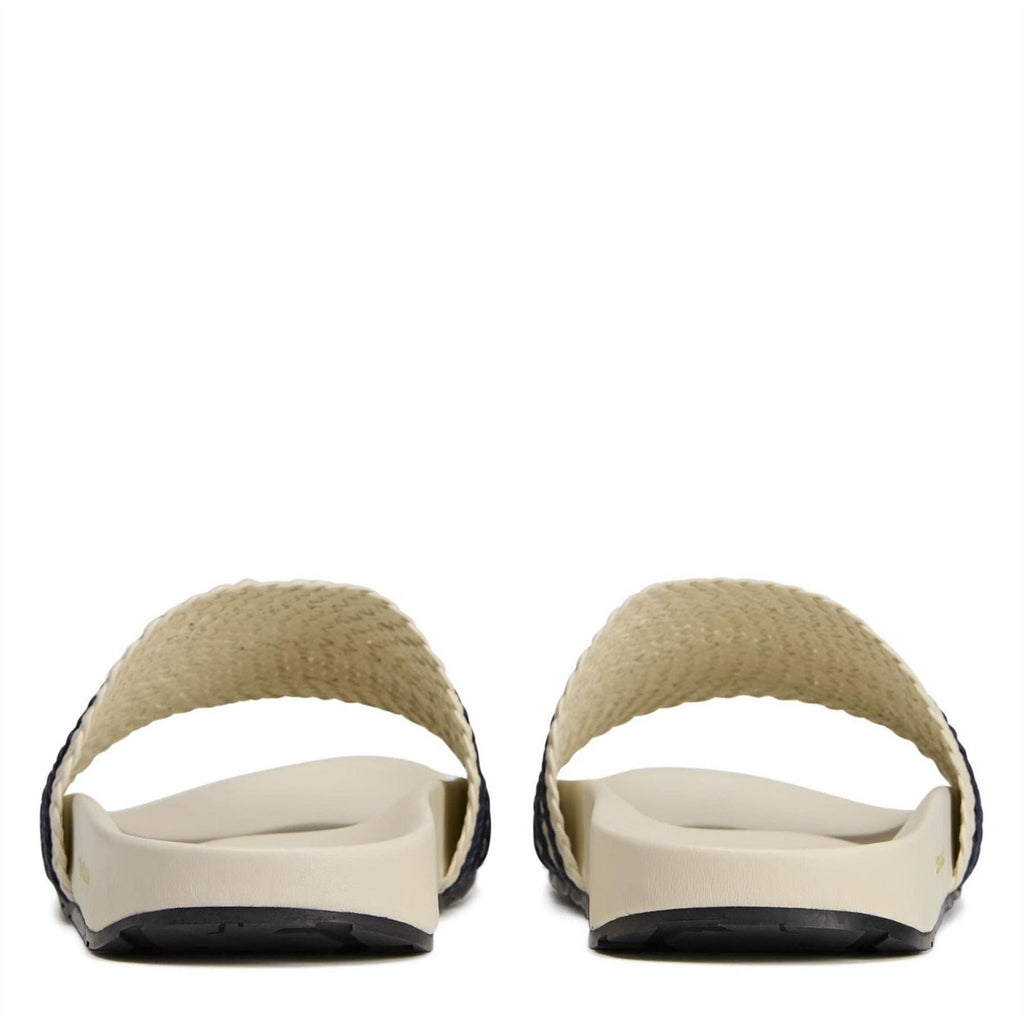 Back view of Wonder White adidas adilette slides with braided top strap