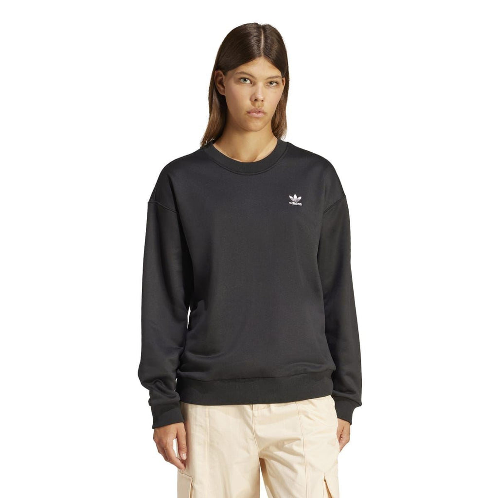 Black adidas Originals crew sweatshirt on model with small chest trefoil logo