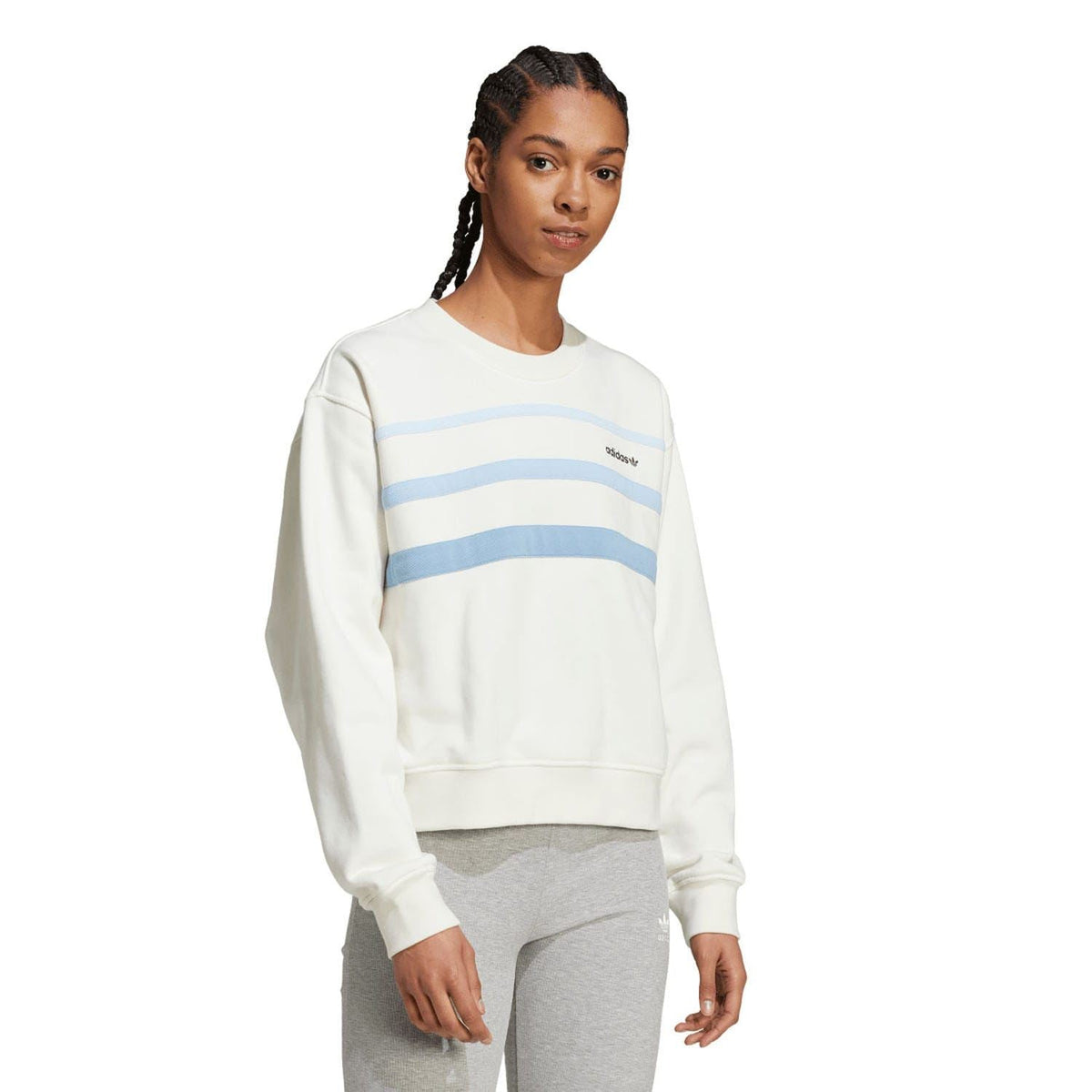 Off-white crewneck sweatshirt with blue striped bands and small adidas logo