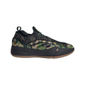 Black-and-green camouflage trainers with lace-up front and low-profile rubber sole
