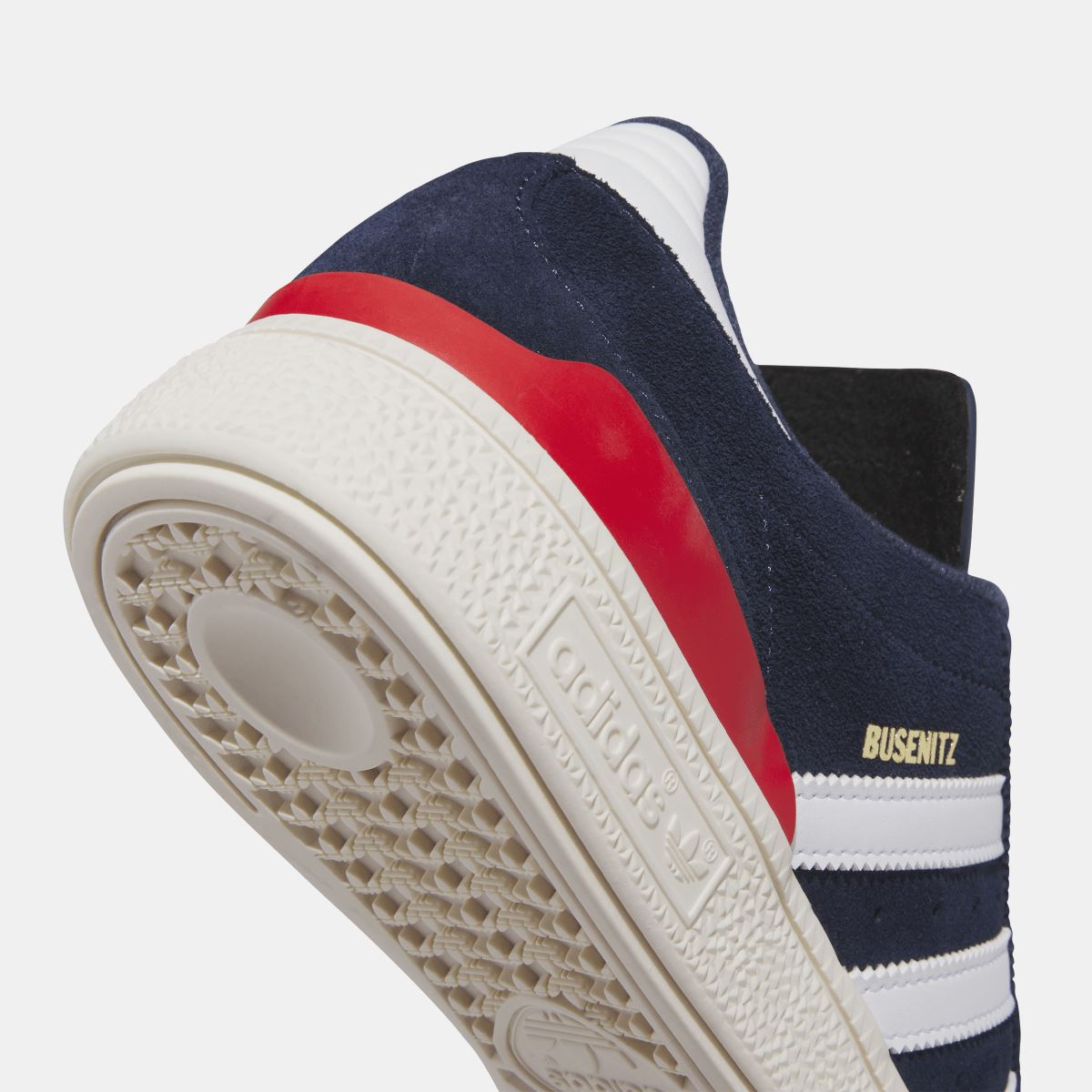 Navy Busenitz shoe heel and outsole detail with white tread and adidas logo