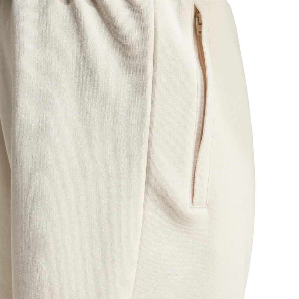 Wonder White Essentials shorts close-up of knit fabric and quarter-zip pocket opening