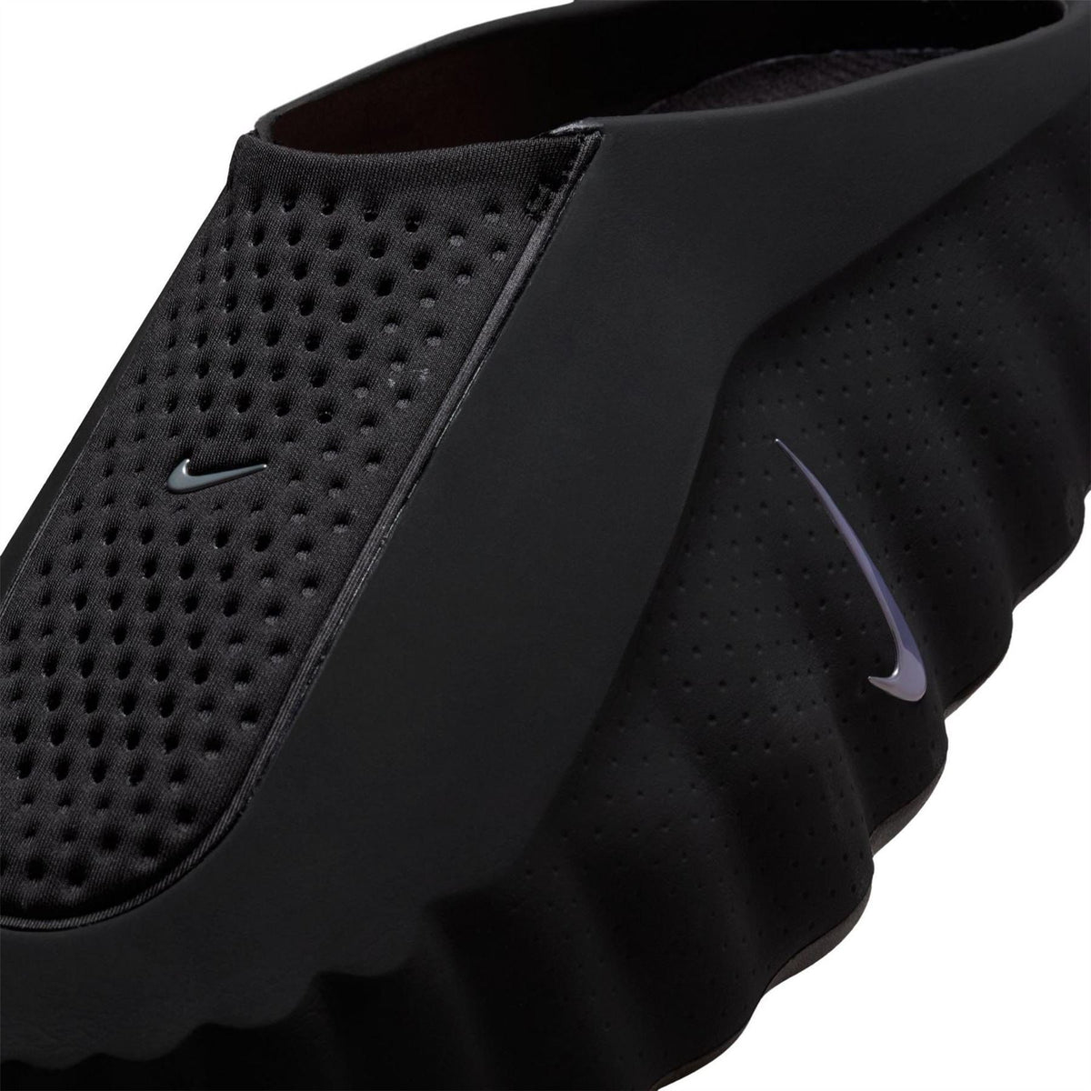 Nike Mind 001 sandals black slip-on with perforated sides and Nike Swoosh