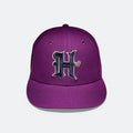 Purple baseball cap with embroidered H logo on the front panel