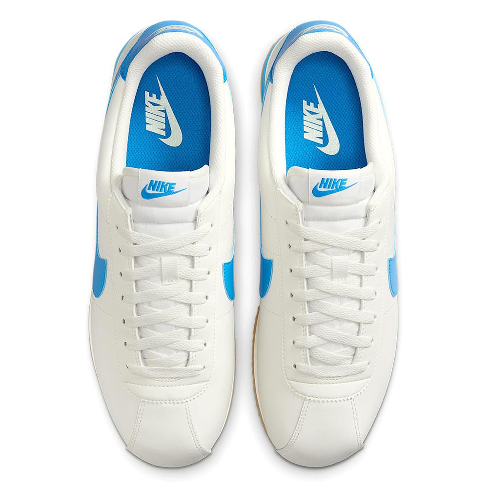 Nike lace-up sneakers, white with blue tongue lining and Nike logo on tongue
