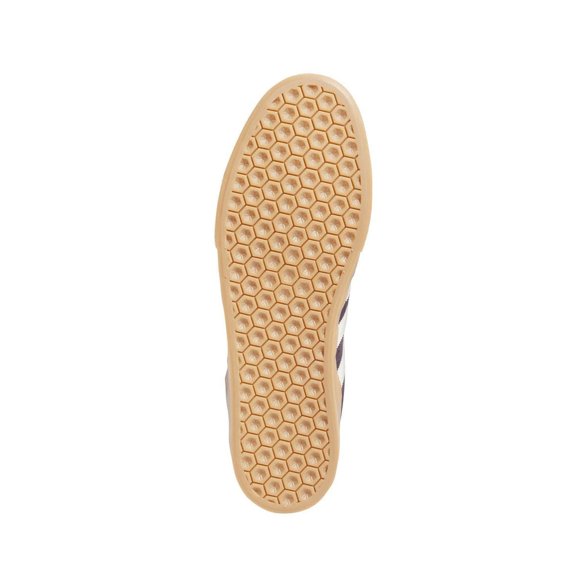 Gum outsole for dark skate trainers with hex-pattern traction tread
