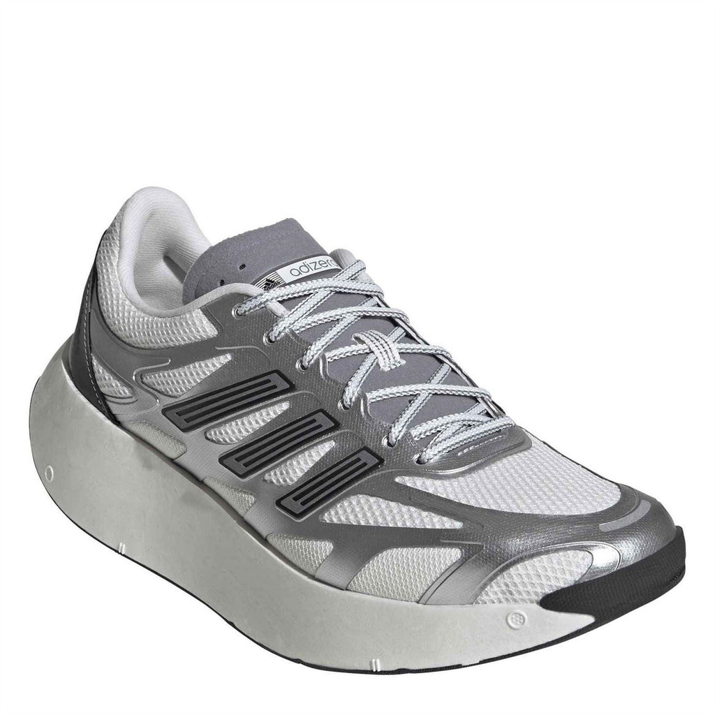 Silver and dark gray running shoe with lace-up closure and thick midsole