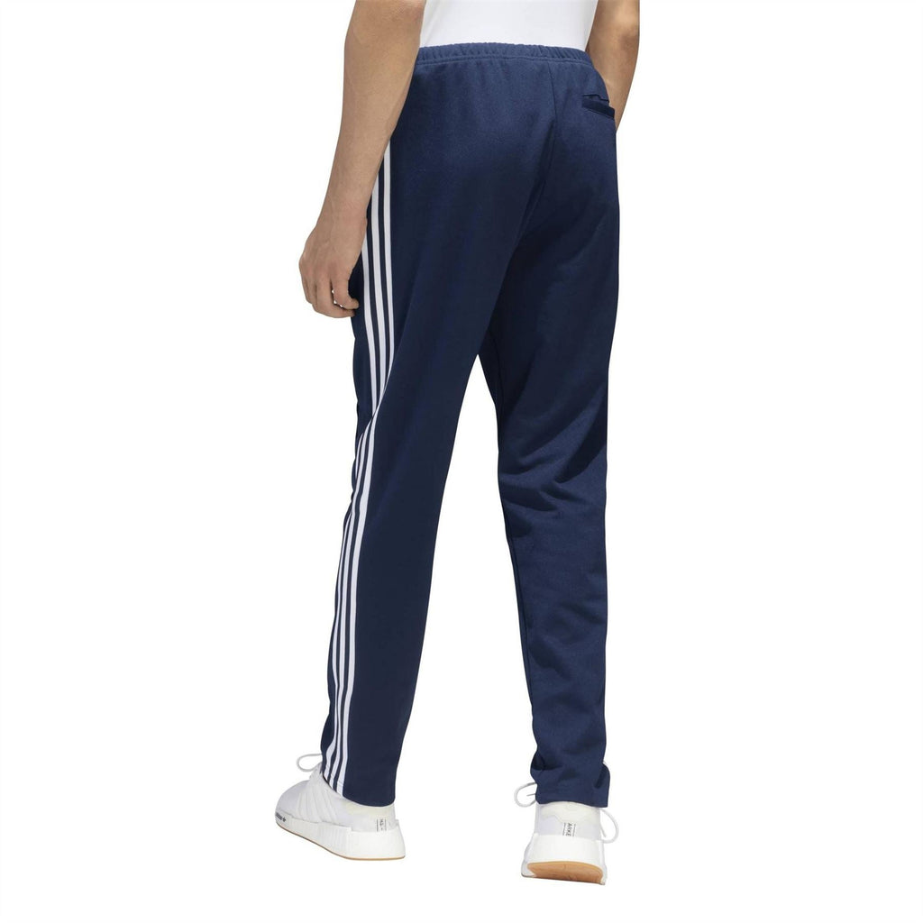 adidas track pants, dark navy with white side stripes and tapered ankle cuffs