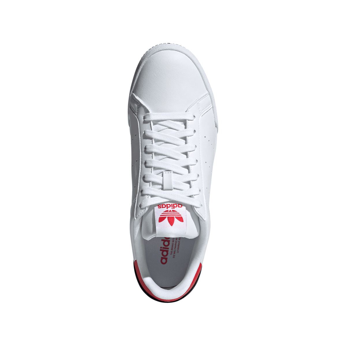 White adidas Originals trainers with lace-up front and adidas branding on tongue