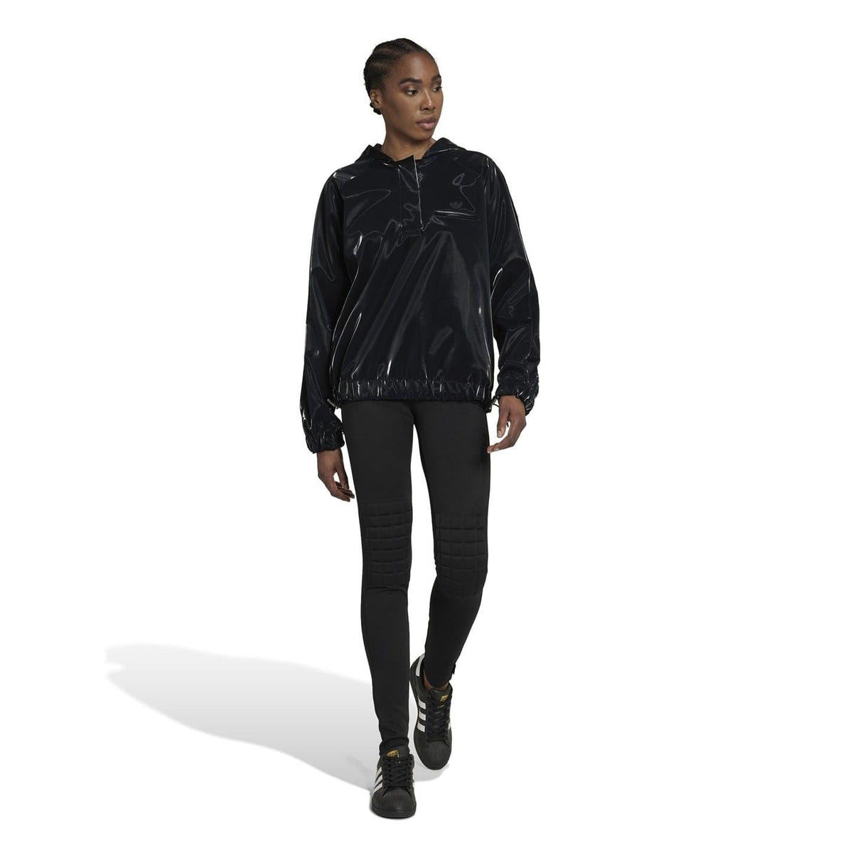 Black performance tights with quilted knee panels and ankle length