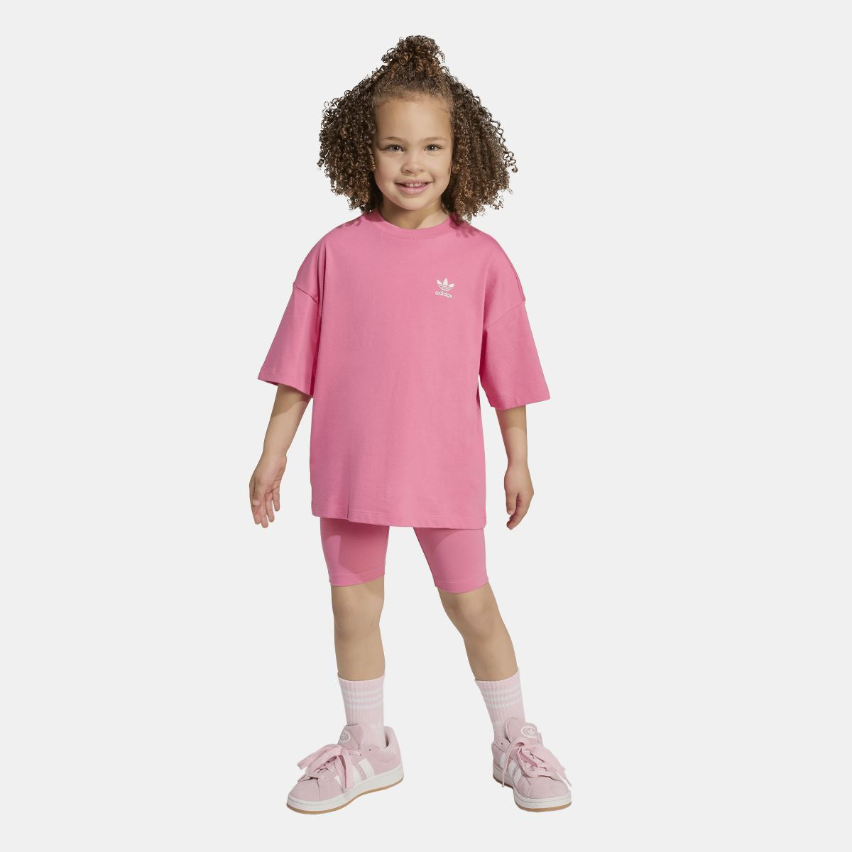 Infants pink adidas T-shirt and shorts set on model, trefoil logo on chest