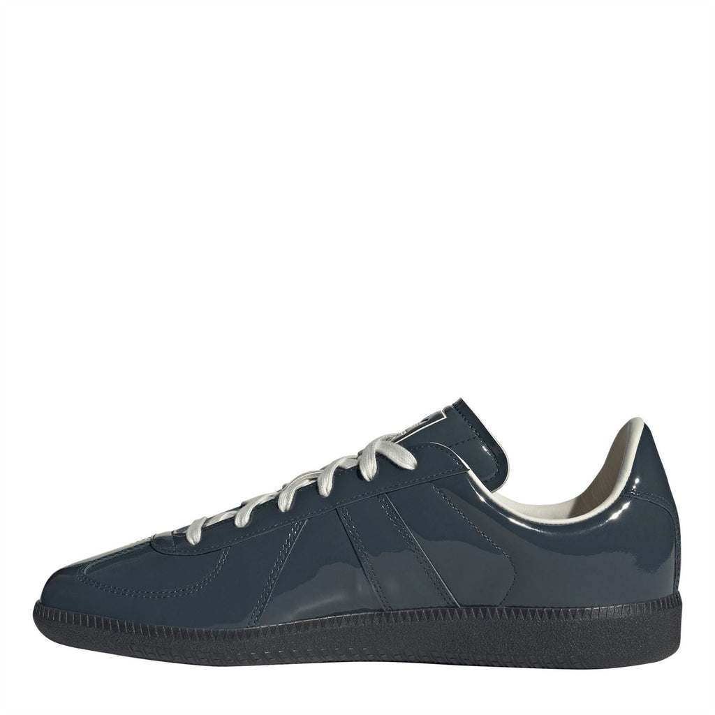 Dark petrol blue adidas Originals sneakers with white laces and stitched panel details