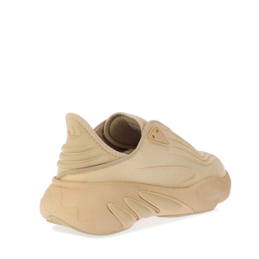 Beige trainers with knitted upper, adidas logo patch, padded heel collar