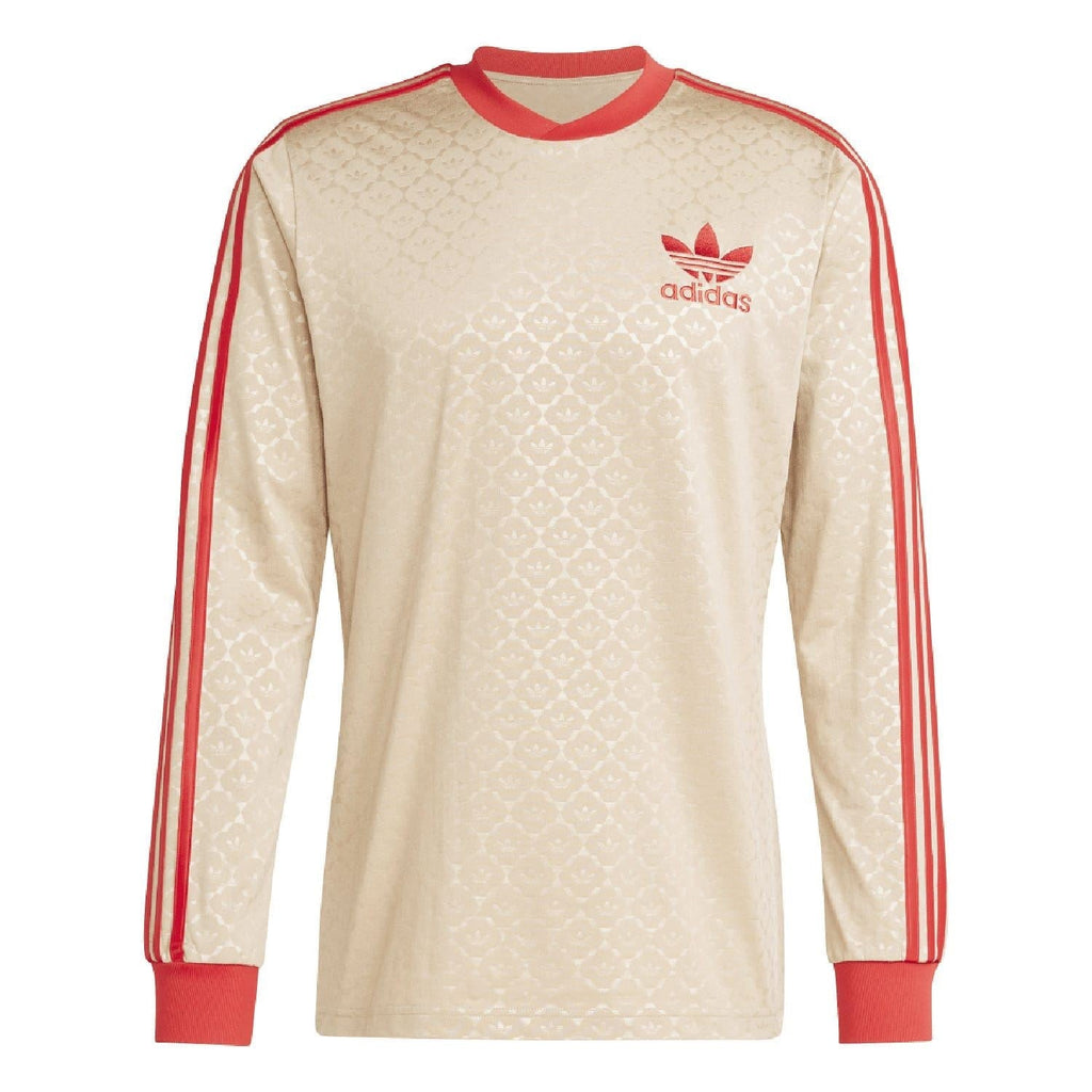 Beige adidas Originals jersey with red adidas logo on chest and sleeve stripe details