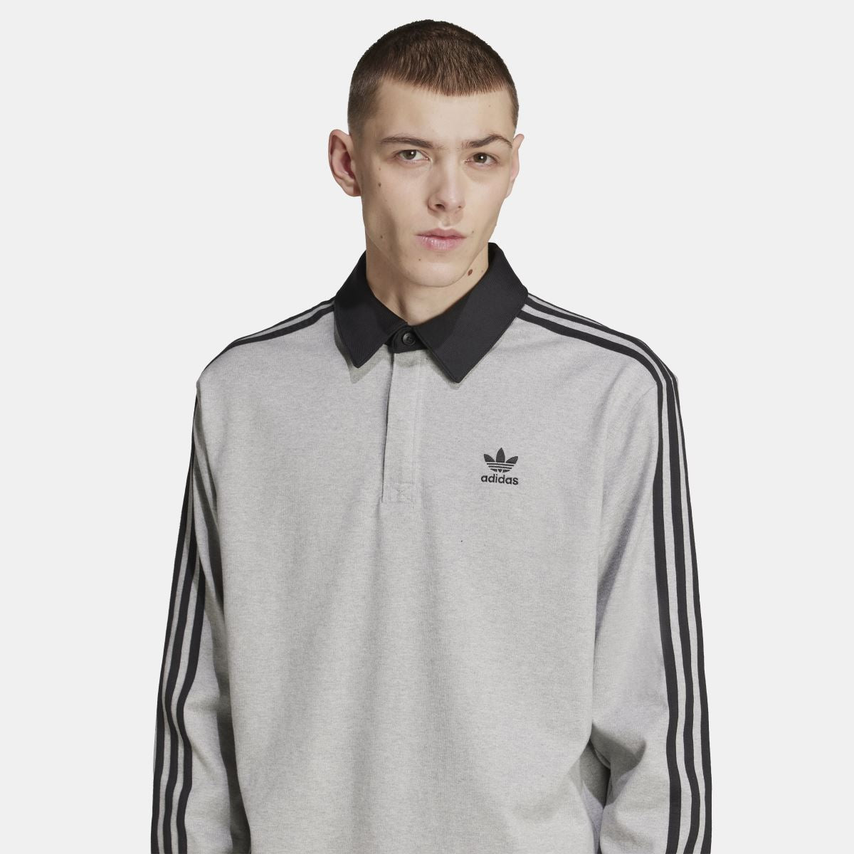 Grey rugby polo shirt with black collar and adidas logo on left chest