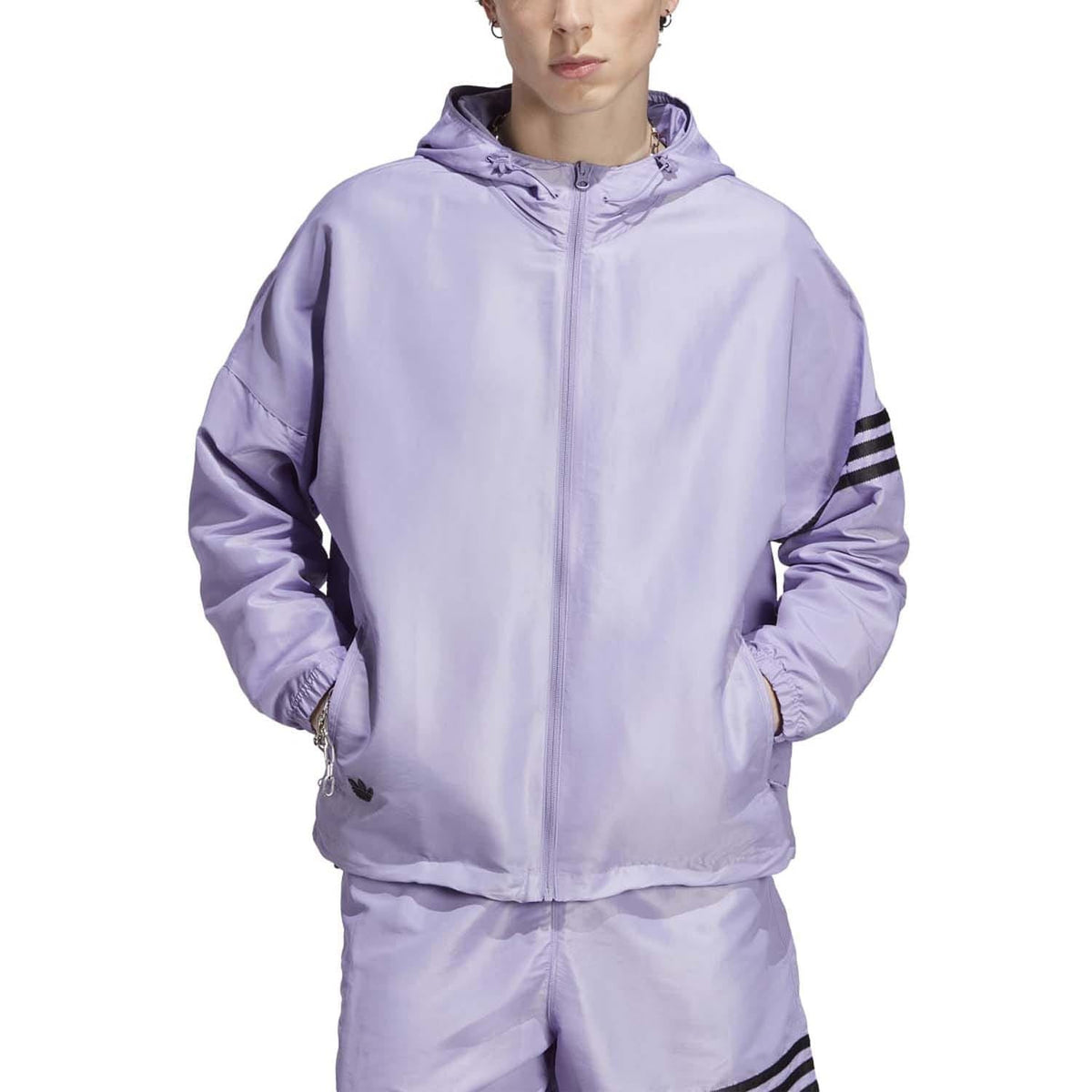 Lilac hooded windbreaker with full-zip front, elastic cuffs, and adidas sleeve stripes