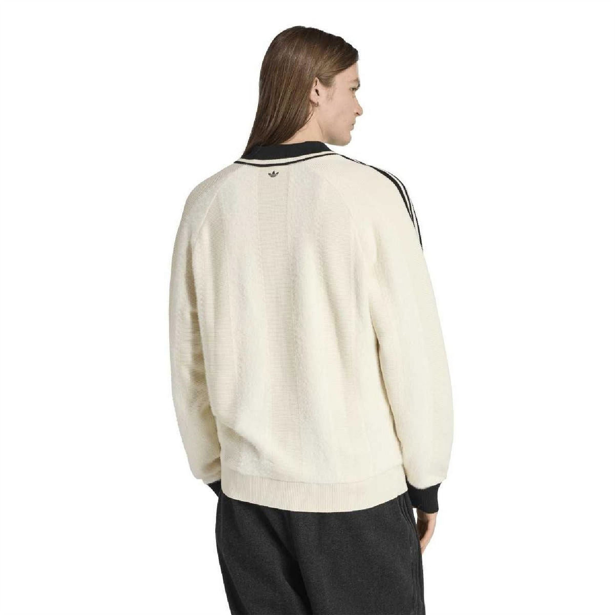 Back view of cream-white collared raglan sweater with black stripe bands on sleeves