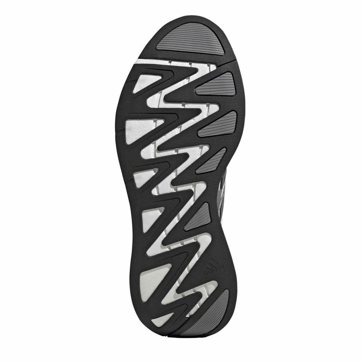 Black and gray outsole for silver running shoes with textured tread pattern