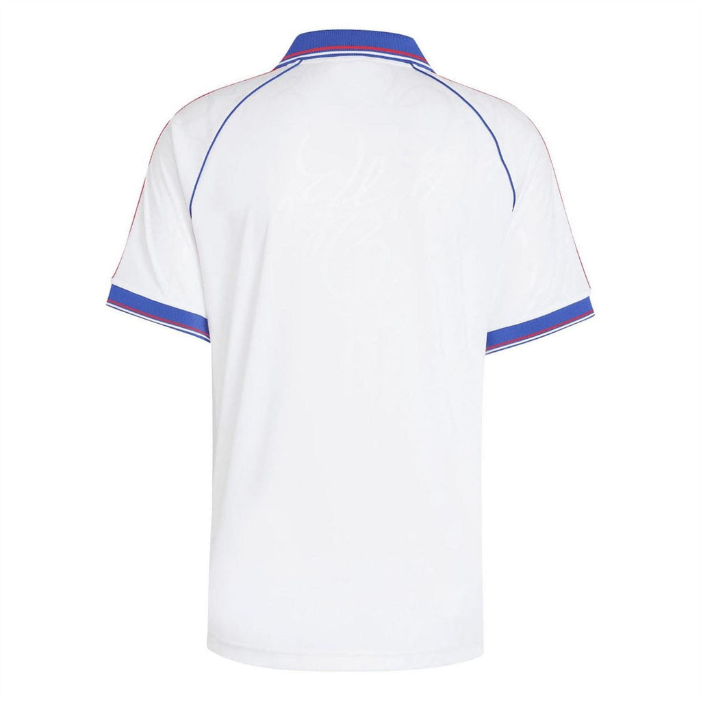 adidas Originals Bellingham Polo Shirt in navy with white accents, featuring a classic collar and adidas logo on chest.