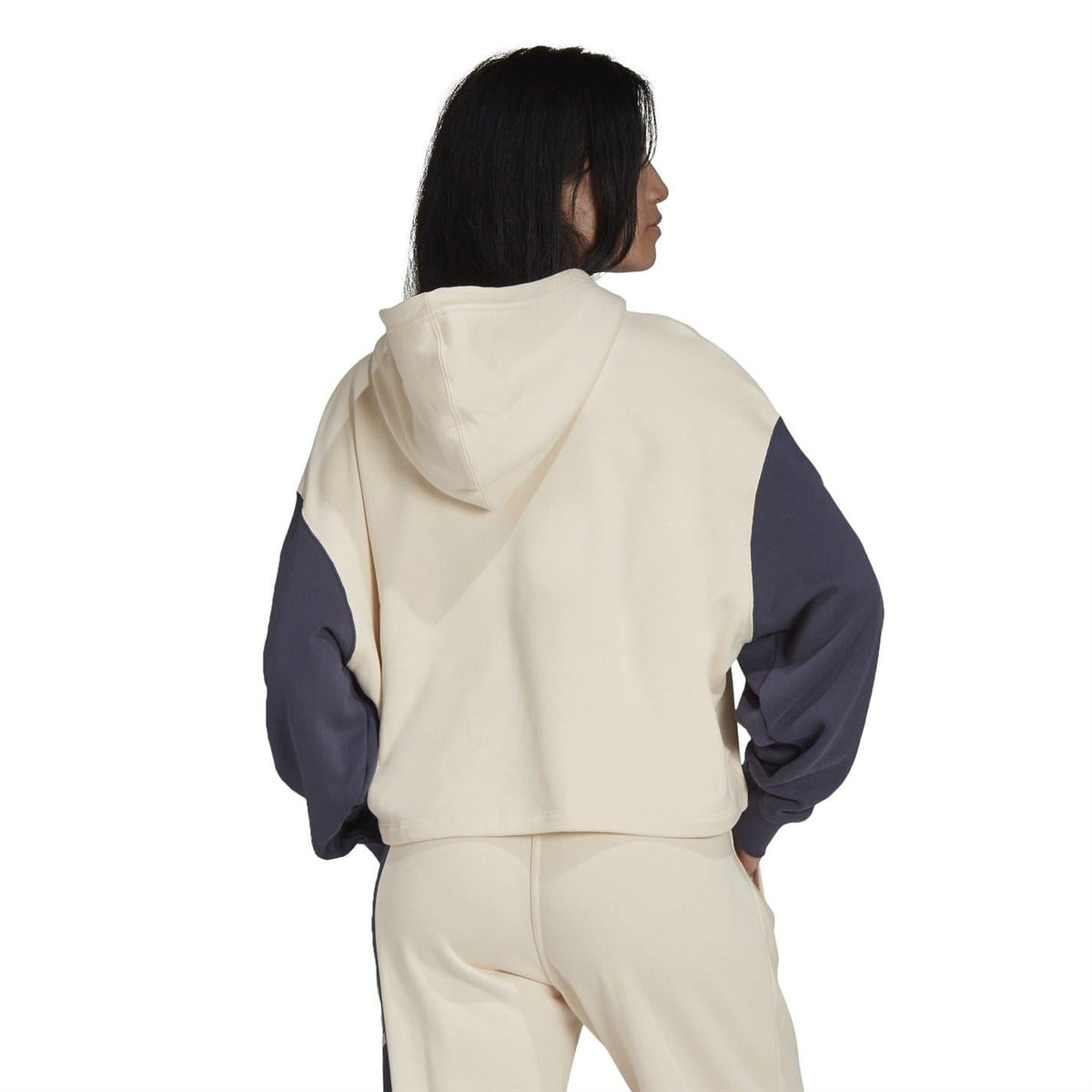 Back view cropped hoodie, cream body with navy sleeve panels, hood and kangaroo pocket