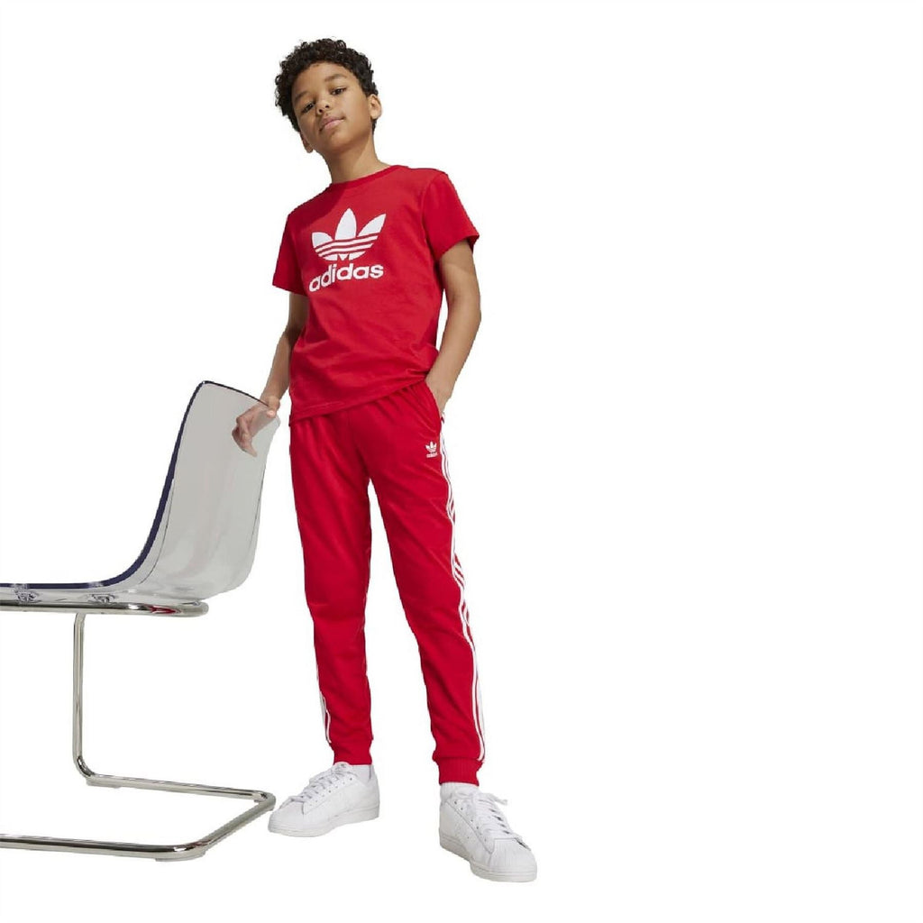 Kids scarlet red T-shirt with adidas trefoil and wordmark, worn with matching pants