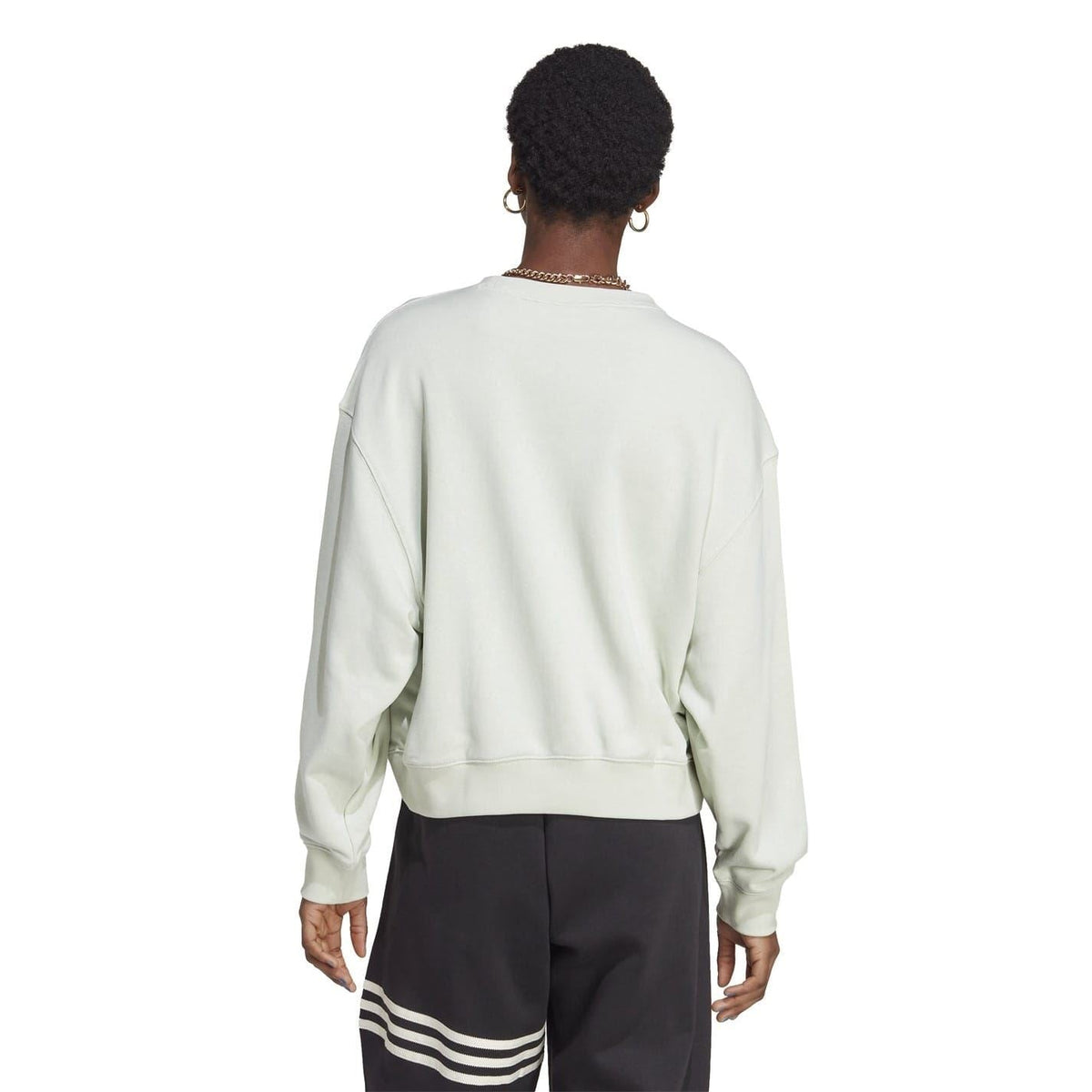 adidas Originals relaxed-fit crewneck sweatshirt, light green, back view with ribbed cuffs