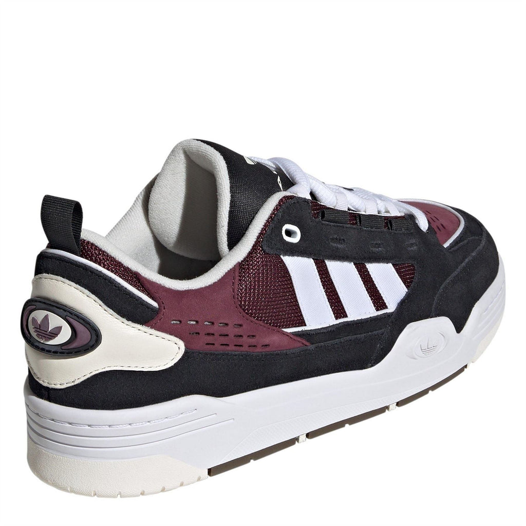 adidas Originals Adi2000 men's low-top trainers in black with white accents, showcasing the classic sneaker design and brand logo