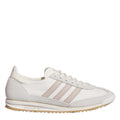 adidas Originals low-top sneakers in white with three taupe stripes and gum sole