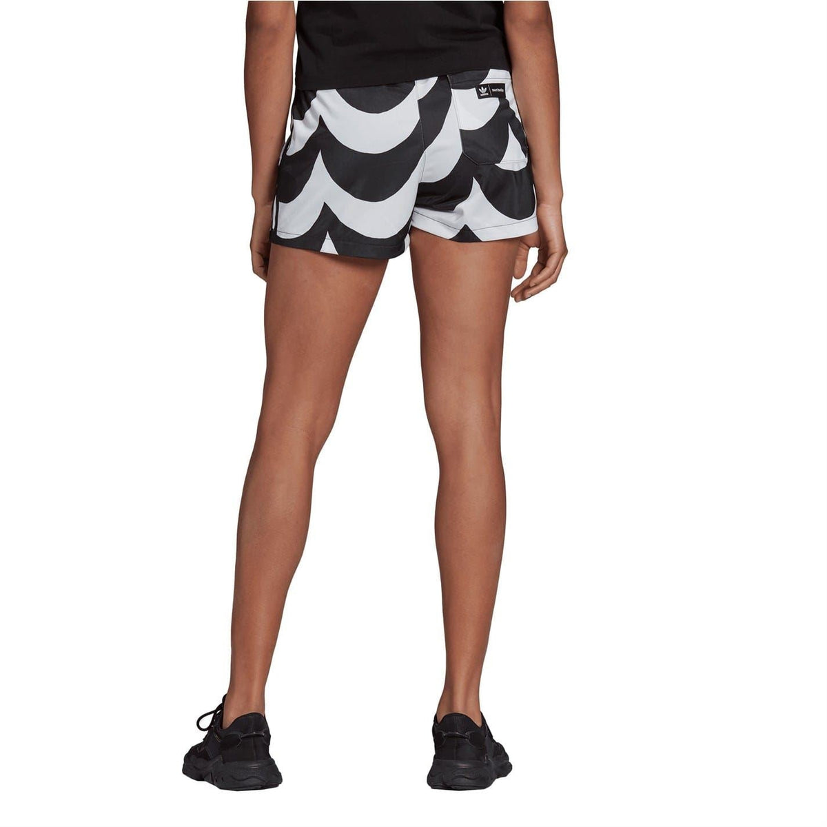 Black and white graphic adidas athletic shorts with elastic waistband and short inseam