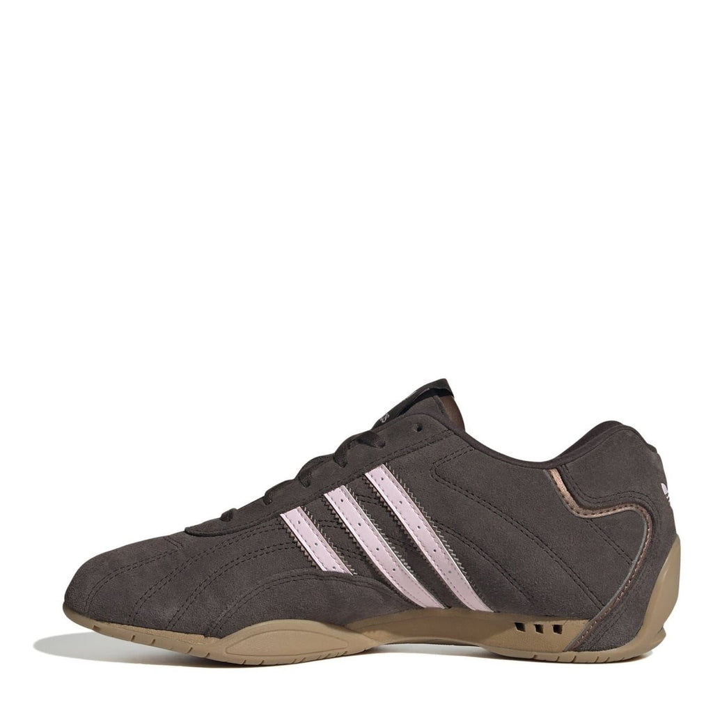Charcoal low-top sneakers with three pale stripes, lace-up, and gum outsole