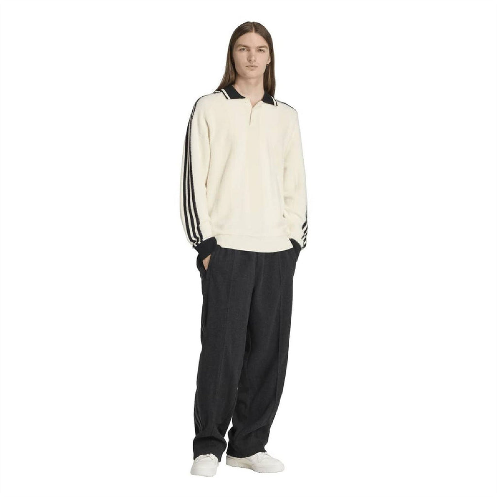 Cream collared raglan sweater with black triple stripe sleeve bands and ribbed hem