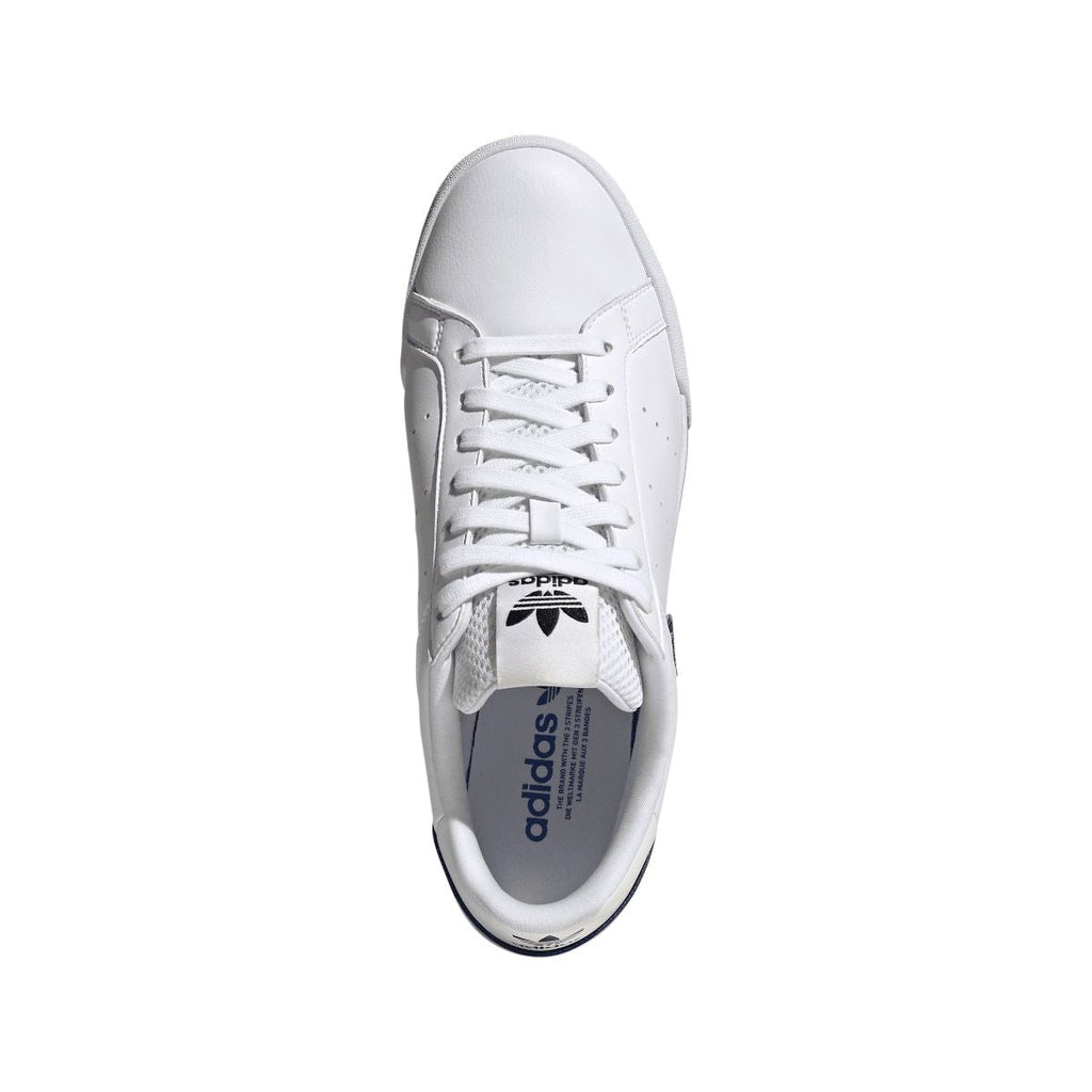 White adidas trainers viewed from above, with white laces and cushioned padded collar
