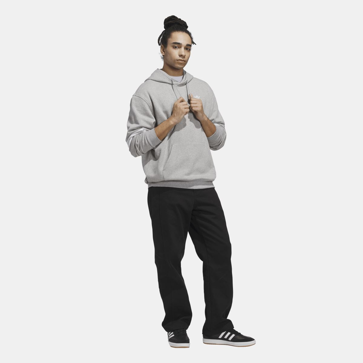 Grey adidas Originals hoodie with drawstring hood, worn by model.