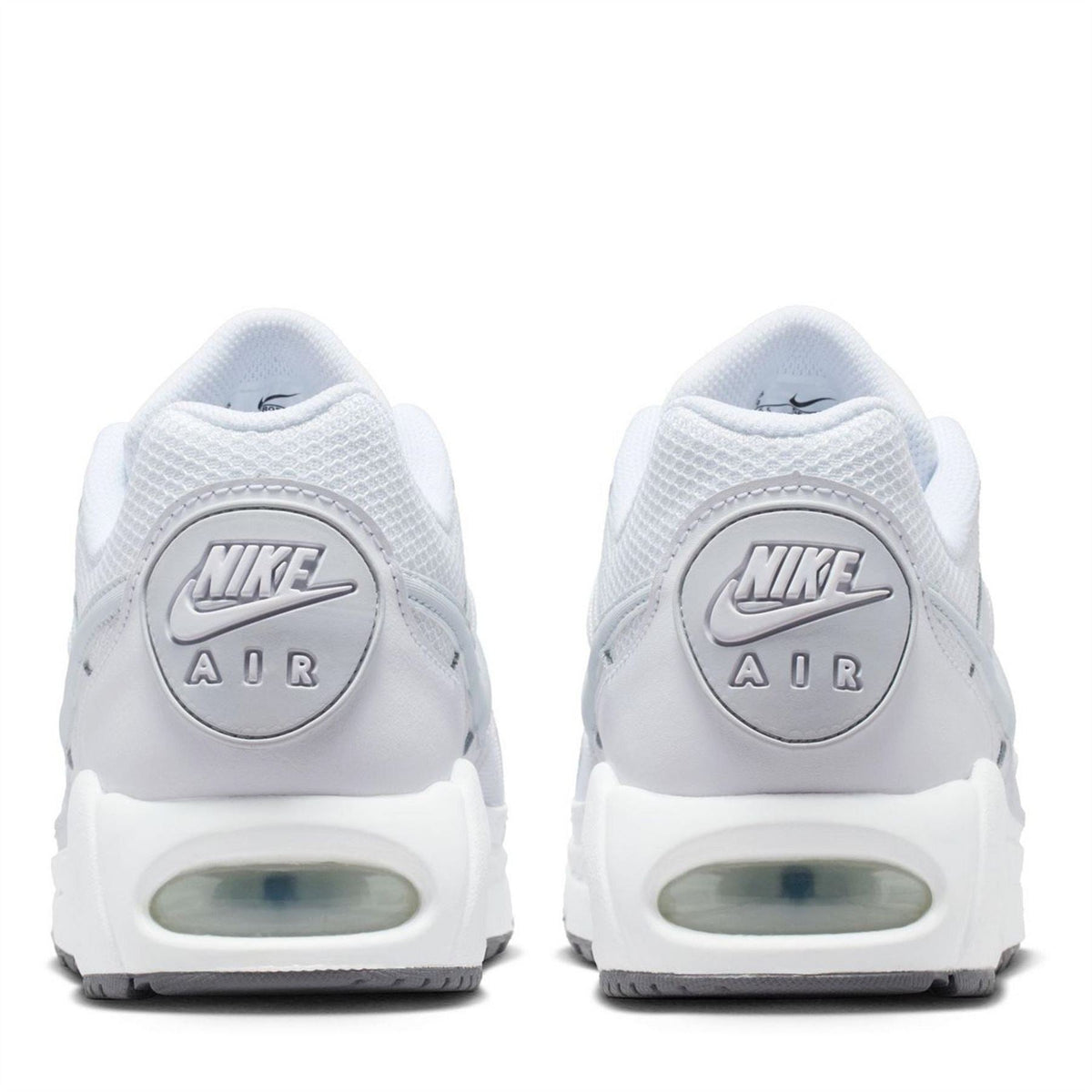 Women's white Air Max sneakers, rear view with Nike Air logo and heel air unit