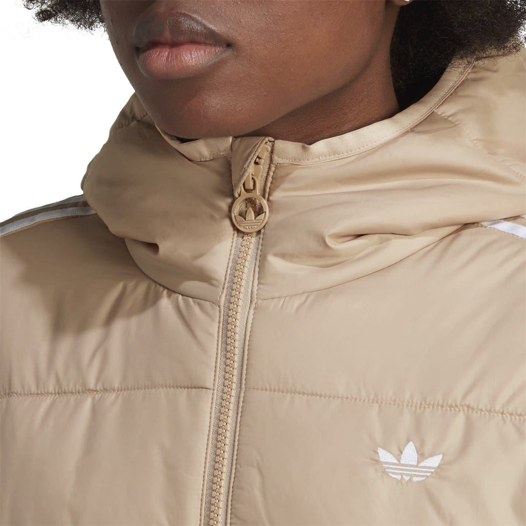 Beige hooded jacket close-up with front zipper and small adidas logo on chest