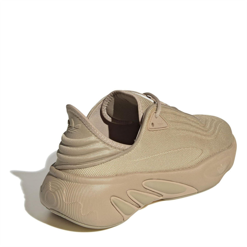 Beige low-top trainers, padded collar and heel panel detail